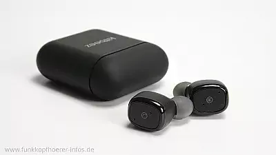 Ladeschale und Kopfhörer