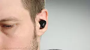 Ohr mit Kopfhörer